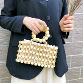 Pochette rétro tissée à la main avec perles en bois naturel, sac de plage cubique transparent